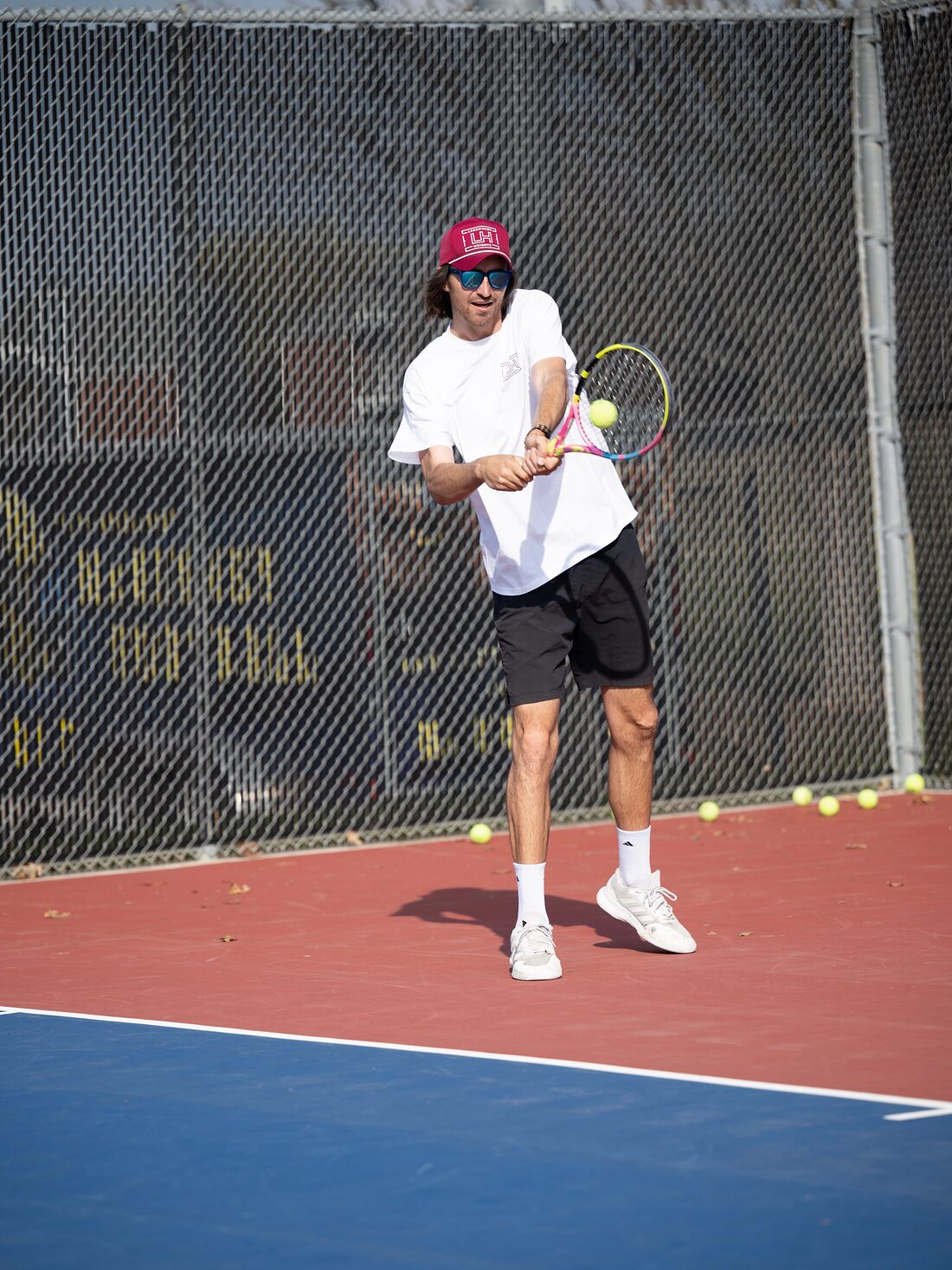 Two-handed backhand during a semi-private session